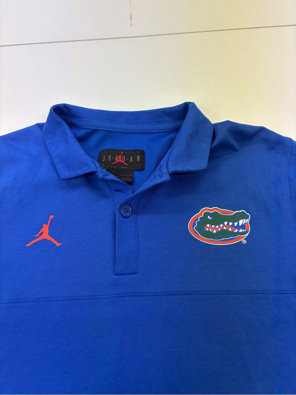JORDAN POLO SHIRT  BASKETBALL 
MEN LARGE    GATORS
BLUE & ORANGE